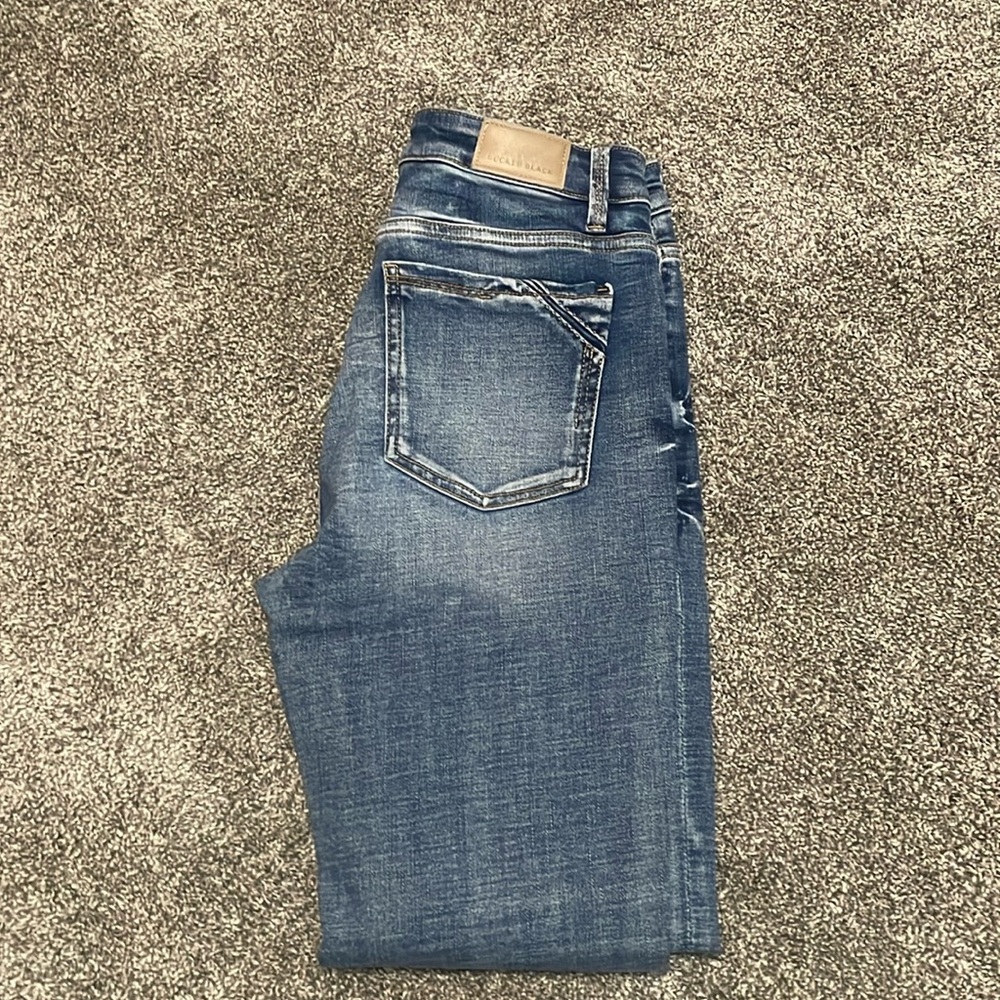 Buckle black jeans